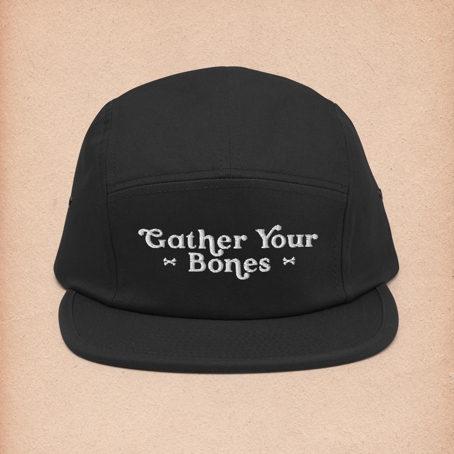 Black Camper Hat with "Gather Your Bones" text logo