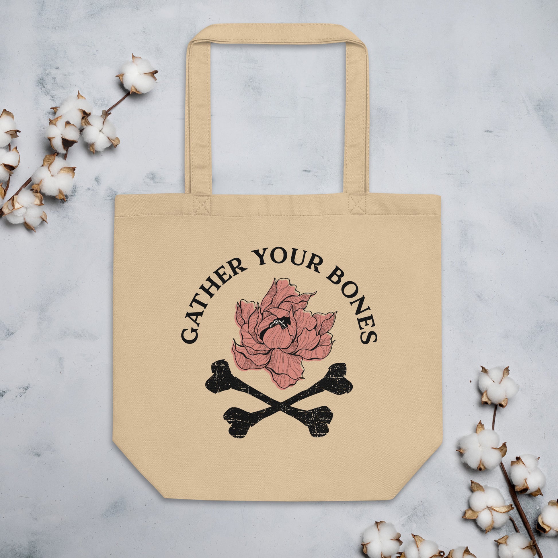 Tan Eco Tote Bag with "Gather Your Bones" peony and crossbones logo